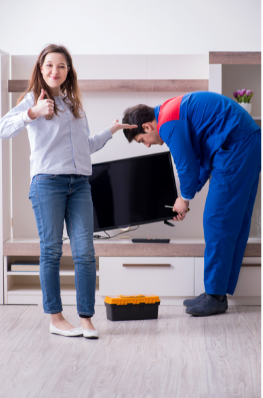 LED TV technician repairing TV at customer’s home in Visakhapatnam – happy customer satisfied with service
