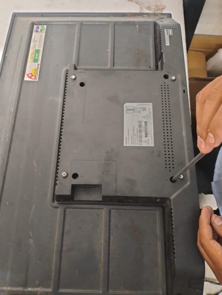  technician repairing the Samsung LED TV Repair in Vizag 